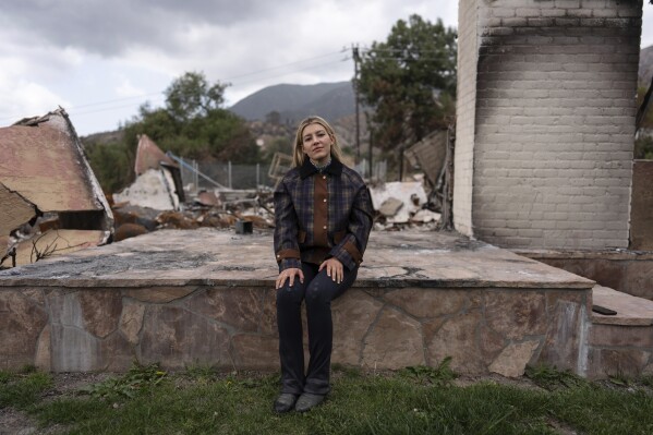 The Renata Ortega float is for a portrait at its home destroyed by Eaton fire in Altadena, California, Saturday, March 29, 2025. (AP Photo/Jae C. Hong)